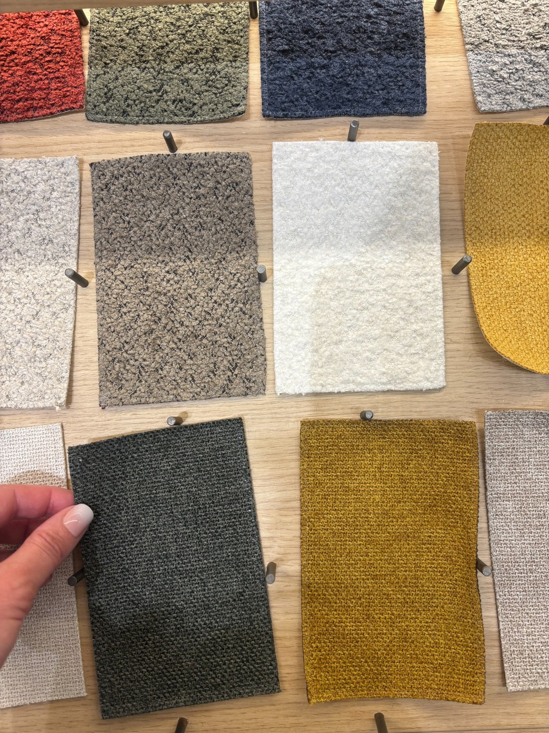 Dark green grey textile sample for rich accent tones in Scandinavian inspired interiors.