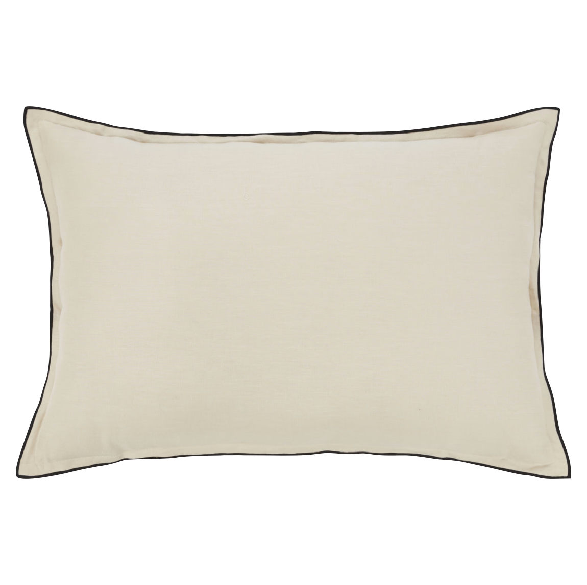 Scandinavian linen cushions styled on guest room bed in neutral palette.