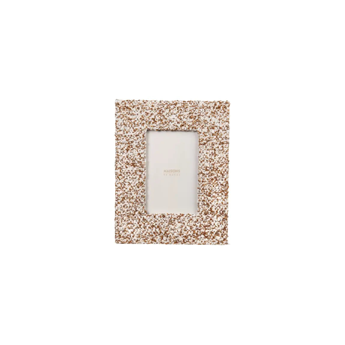 Textured bouclé photo frame in warm ochre and white tones featured in curated interior design package