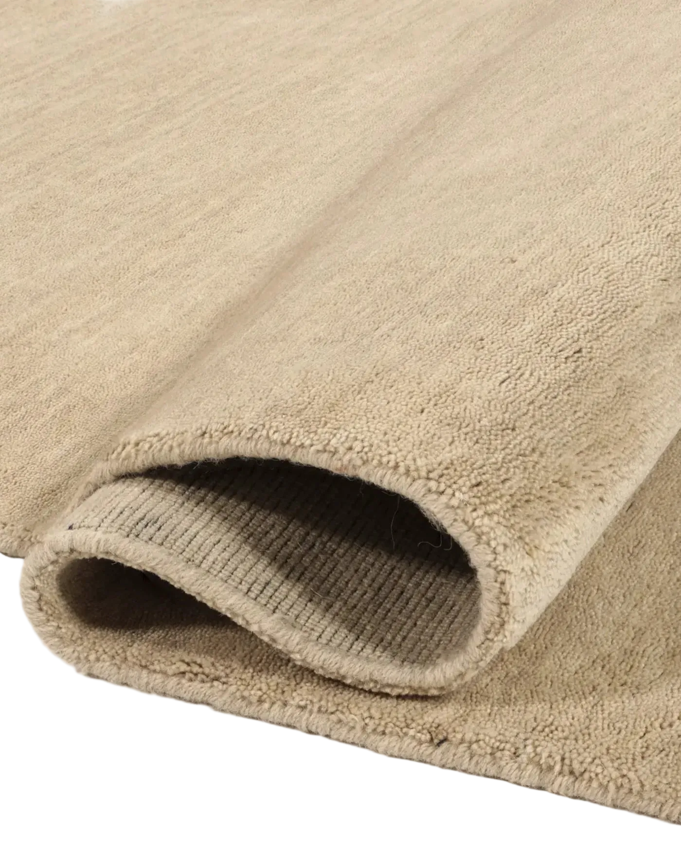 Close-up of beige rug on a white background