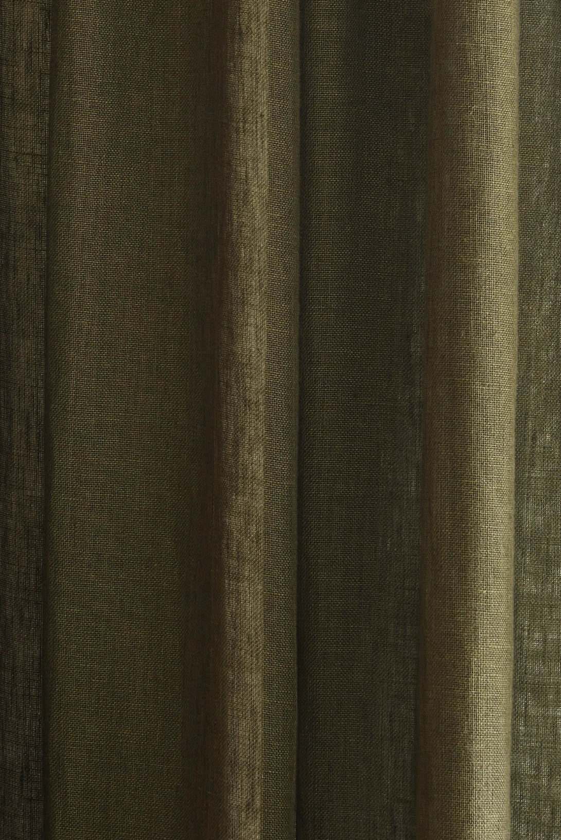 Close-up of a textured linen green curtain