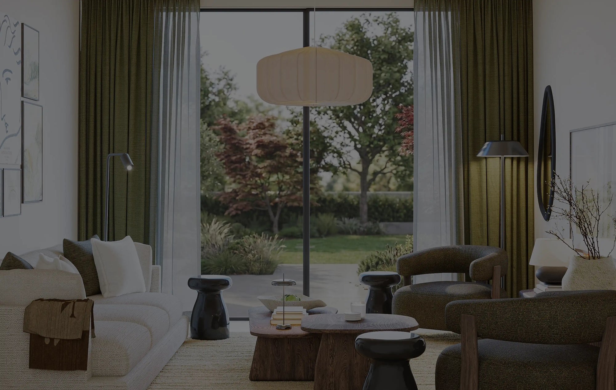Interior-designer curated living room with cream sofa, armchair, pendant lamp, and green curtains – The Ro furniture package by Formed & Furnished
