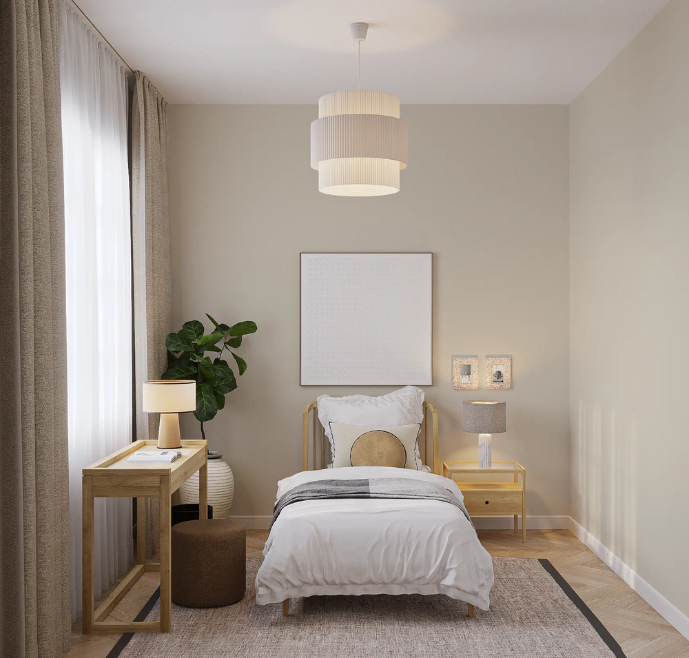 Cozy guest bedroom with Scandinavian-inspired decor and natural materials.