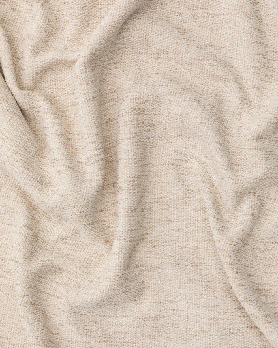 Close-up of cream woven sofa fabric texture – The Ro living room furniture package by Formed & Furnished